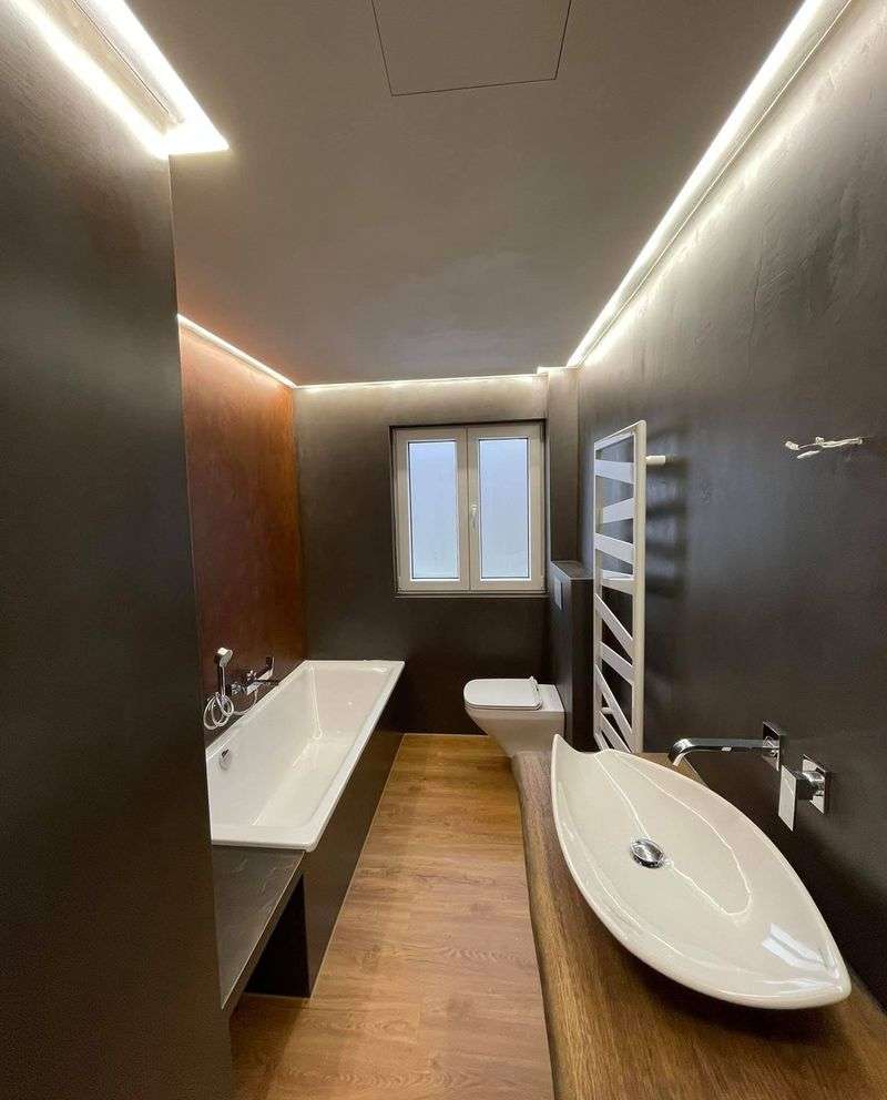 fugenlose-badgestaltung-badsanierung-industrielook-loft-mit-rost-cortenstahl-und-eicheboden-08