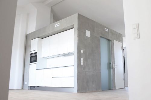 Wandgestaltung in Sichtbetonoptik (Betonlook mit Betonputz)